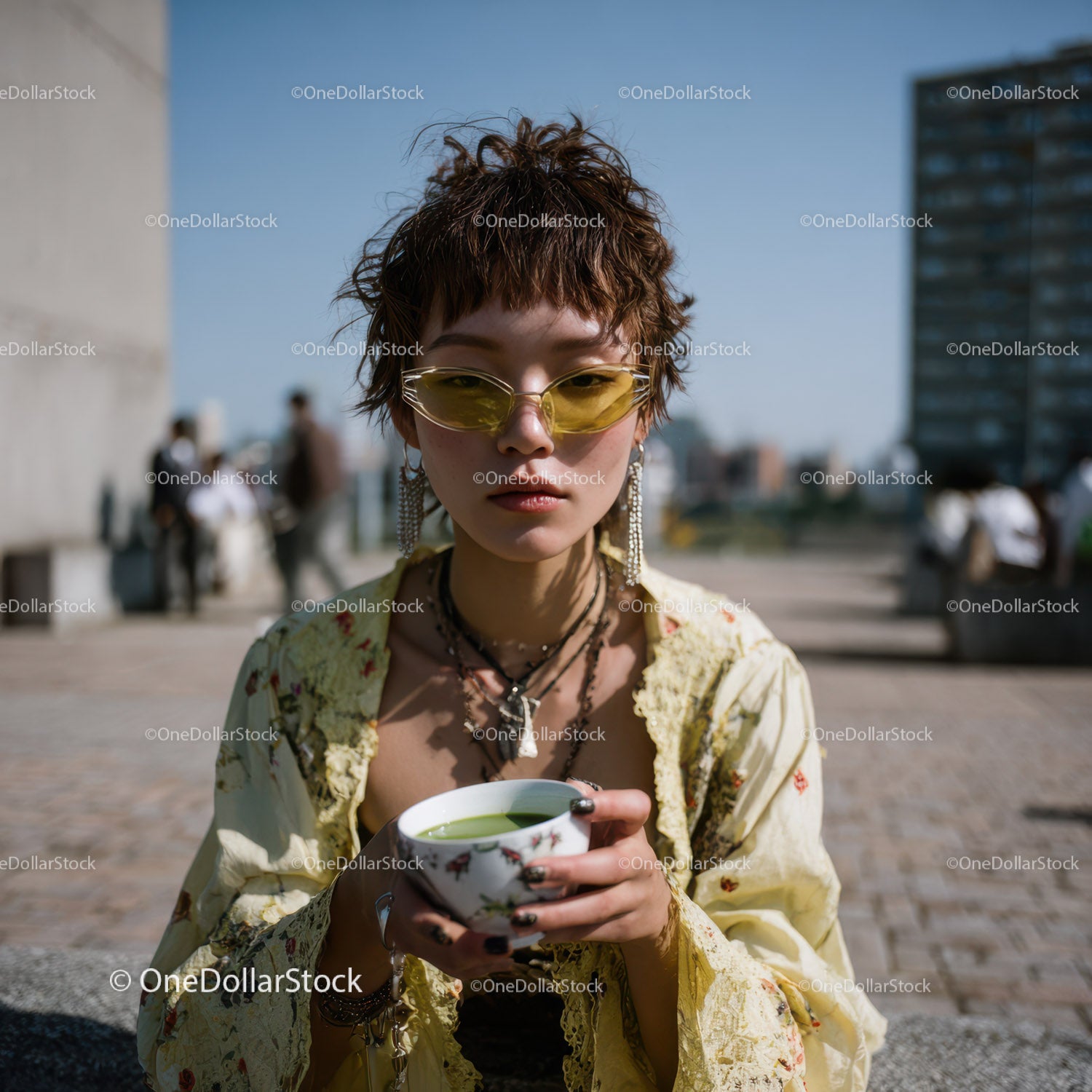 Stylish Young Woman with Short Curly Hair and Yellow Sunglasses Outdoor