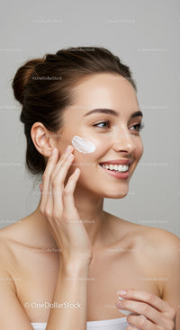 Young Woman Applying Moisturizer for Radiant Skin