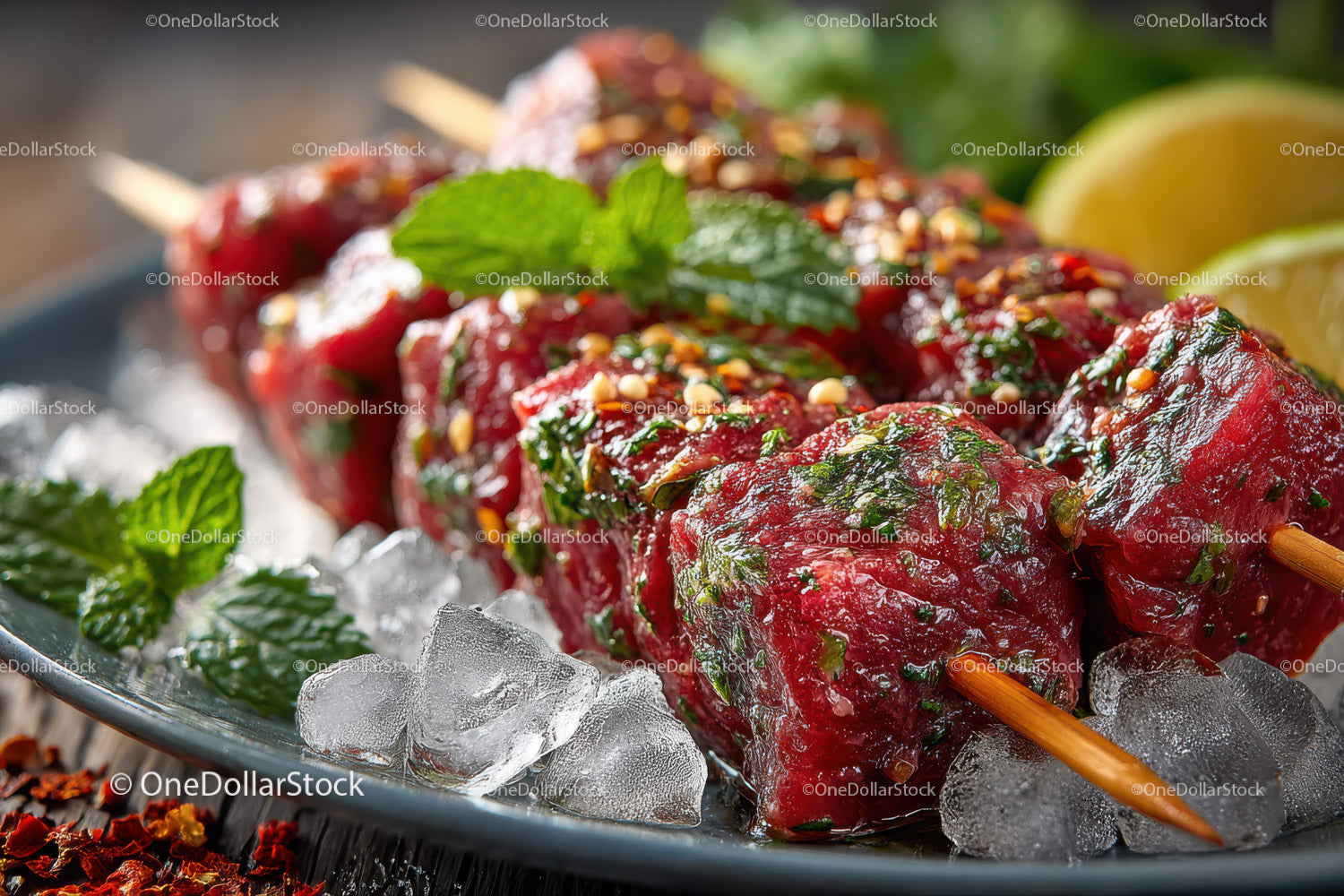 Grilled Beef Skewers with Mint and Lemon on Ice