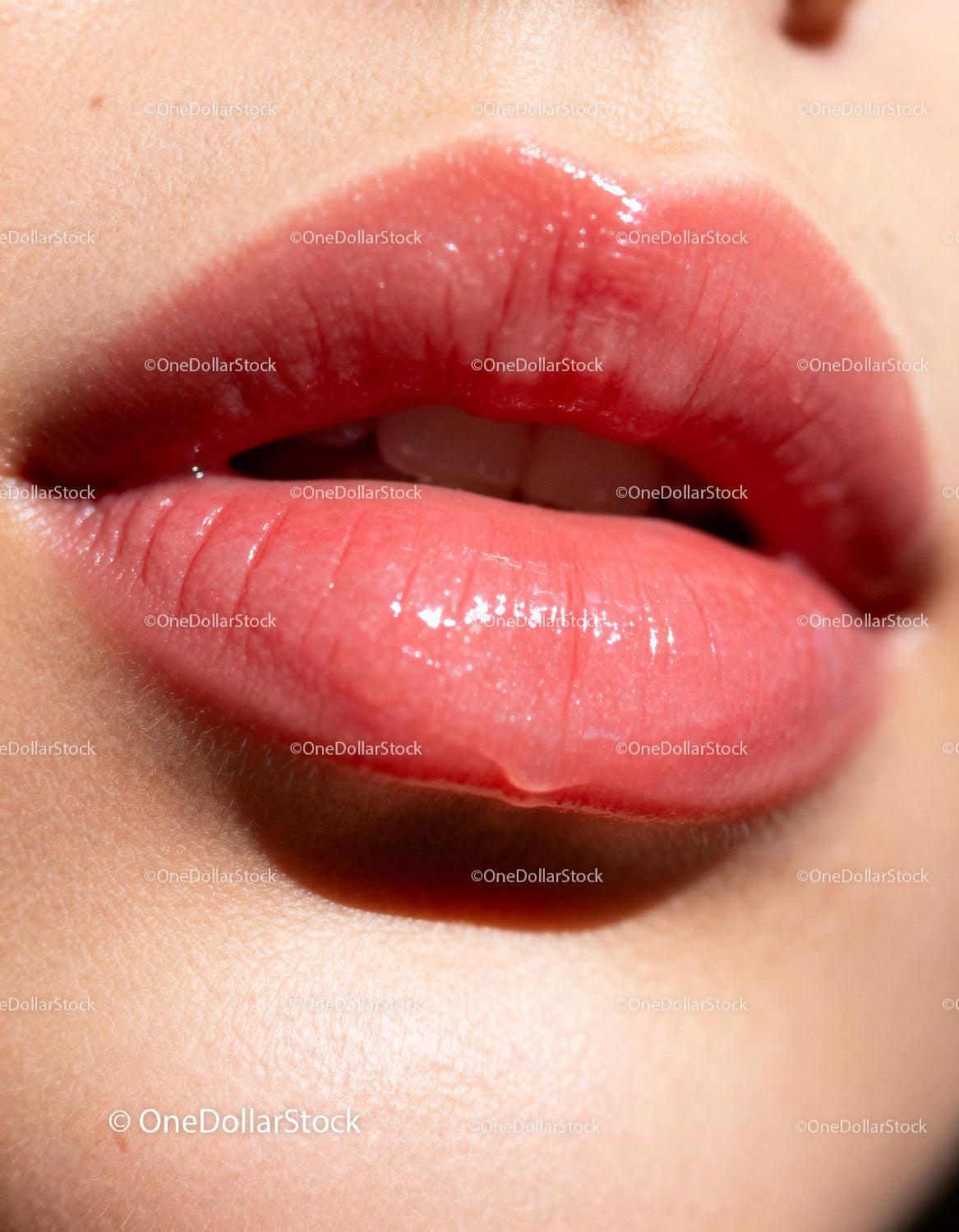 Close Up of Glossy Natural Pink Lips