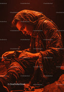 Woman in hood adjusting fishing reel at night