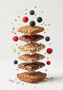 Layered granola bars with chocolate and fresh berries