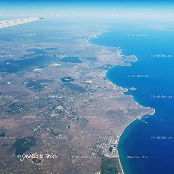 Aerial View of Coastal Towns and Bays with Ocean Shoreline