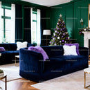 Cozy Living Room with Christmas Tree and Velvet Sofas