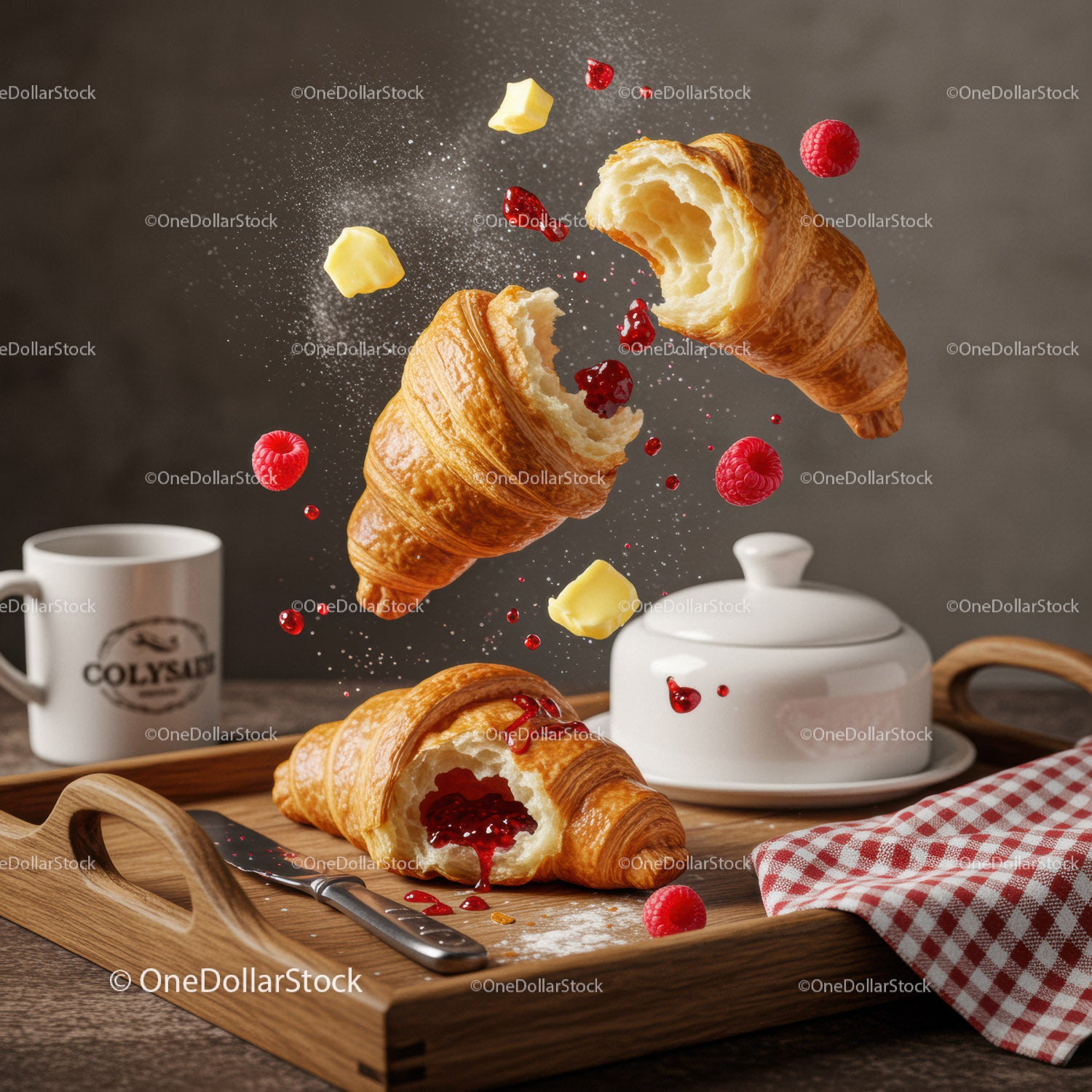 Fresh croissants with raspberry jam and butter on tray
