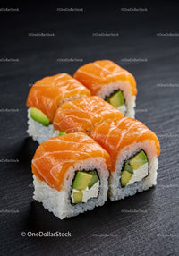 Fresh salmon sushi rolls with avocado and cream cheese
