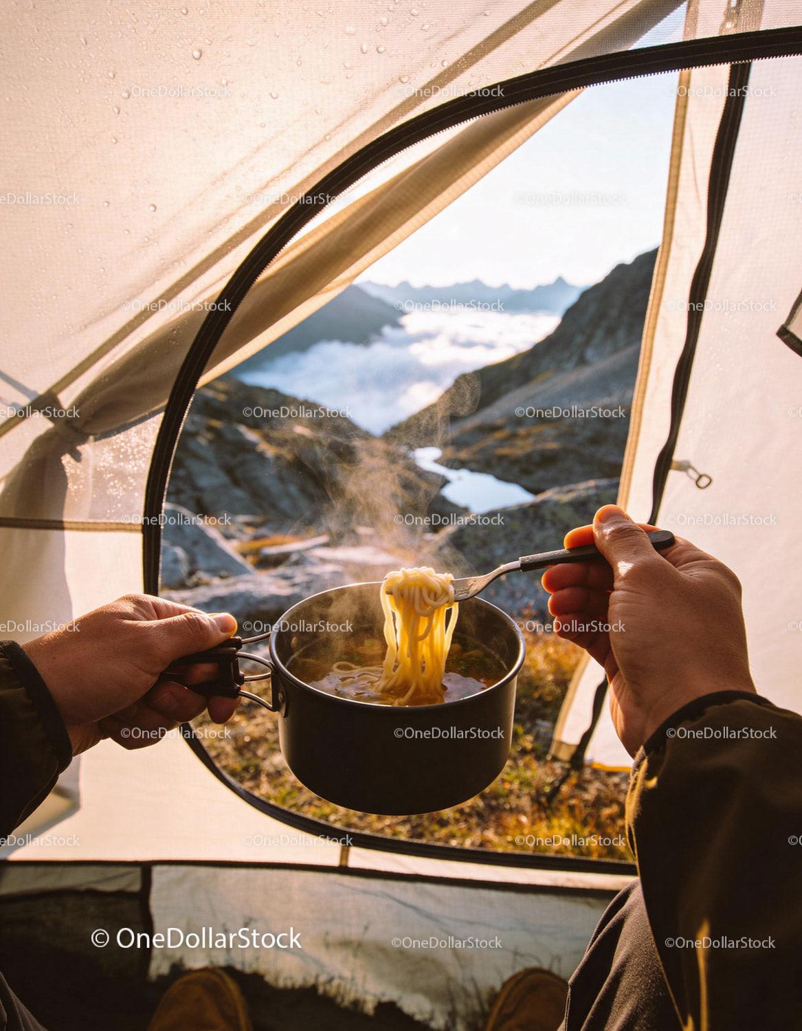 Enjoying Hot Noodles Inside a Mountain Tent at Sunrise