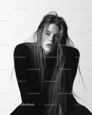 Black and White Portrait of a Young Woman with Long Wet Hair