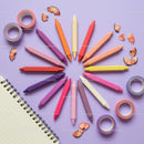 Colorful pastel crayons arranged in circular pattern
