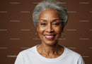 Close-up of a Smiling Elderly Woman with Gray Hair and Hoop Earrings