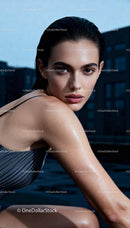 Close up of wet woman with glowing skin outdoors