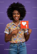 Vibrant Young Woman Holding Like Icon in Bright Casual Outfit