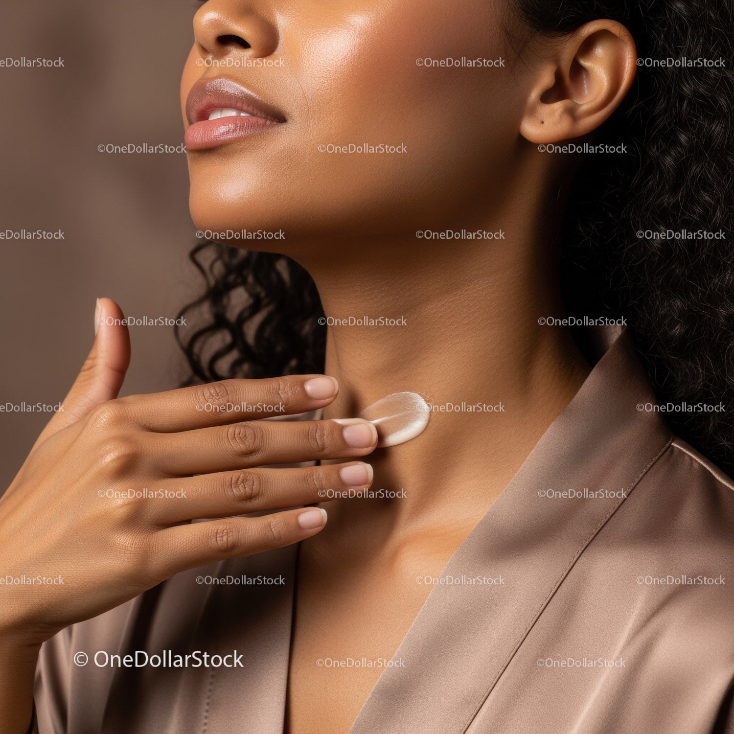 Close-Up of Woman Applying Cream to Face with Beautiful Skin