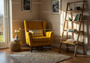 Cozy yellow armchair corner with natural sunlight