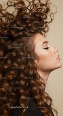 Profile of a Woman with Voluminous Curly Hair