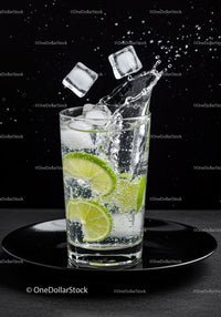 Refreshing lime slices in sparkling water with ice cubes