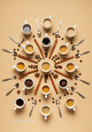 Assorted coffee cups with spices and spoons on beige