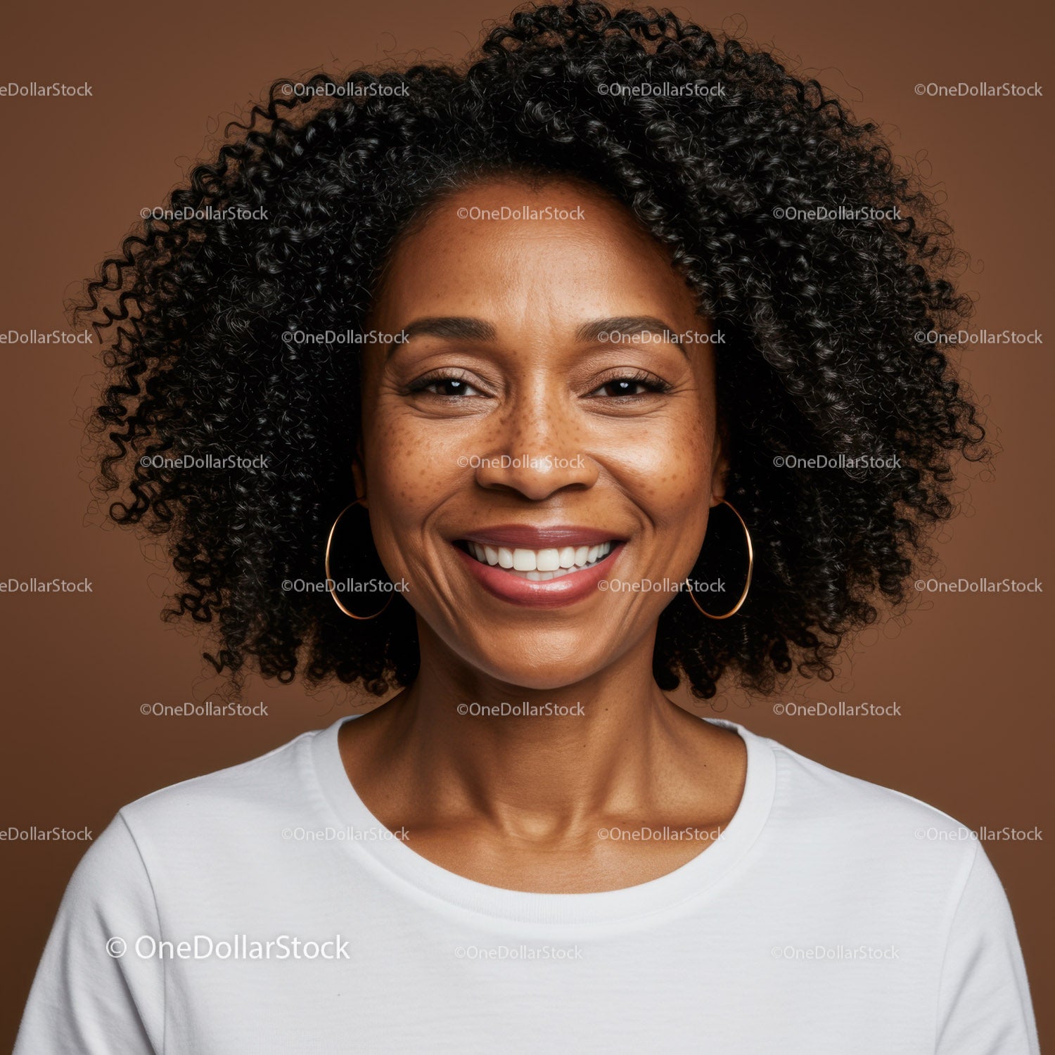 Portrait of a Smiling Woman with Curly Hair and Hoop Earrings