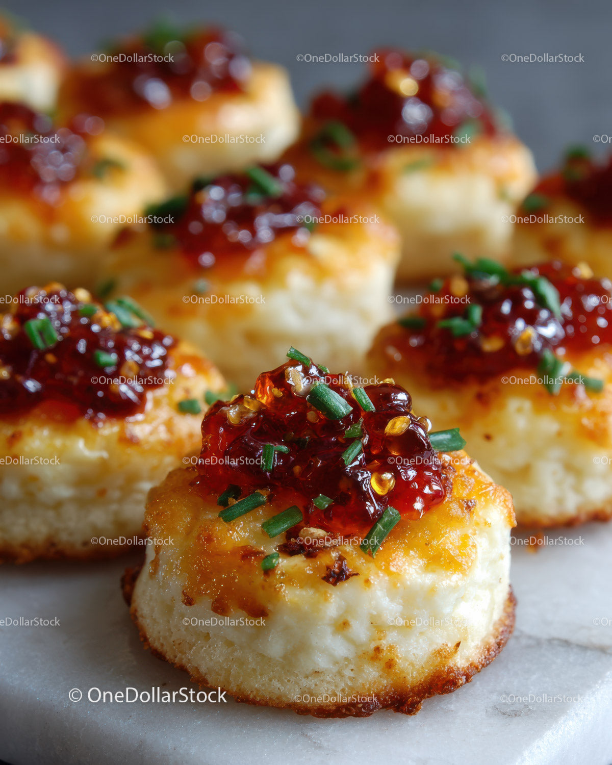 Mini Potato Bites with Chili Sauce and Chives