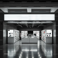Minimalist electronics store interior with modern displays
