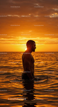 Serene Man Swimming in Ocean During Vibrant Sunset