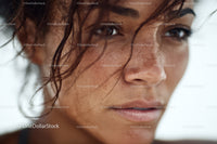 Close-up of a Freckled Woman with Expressive Eyes and Natural Beauty