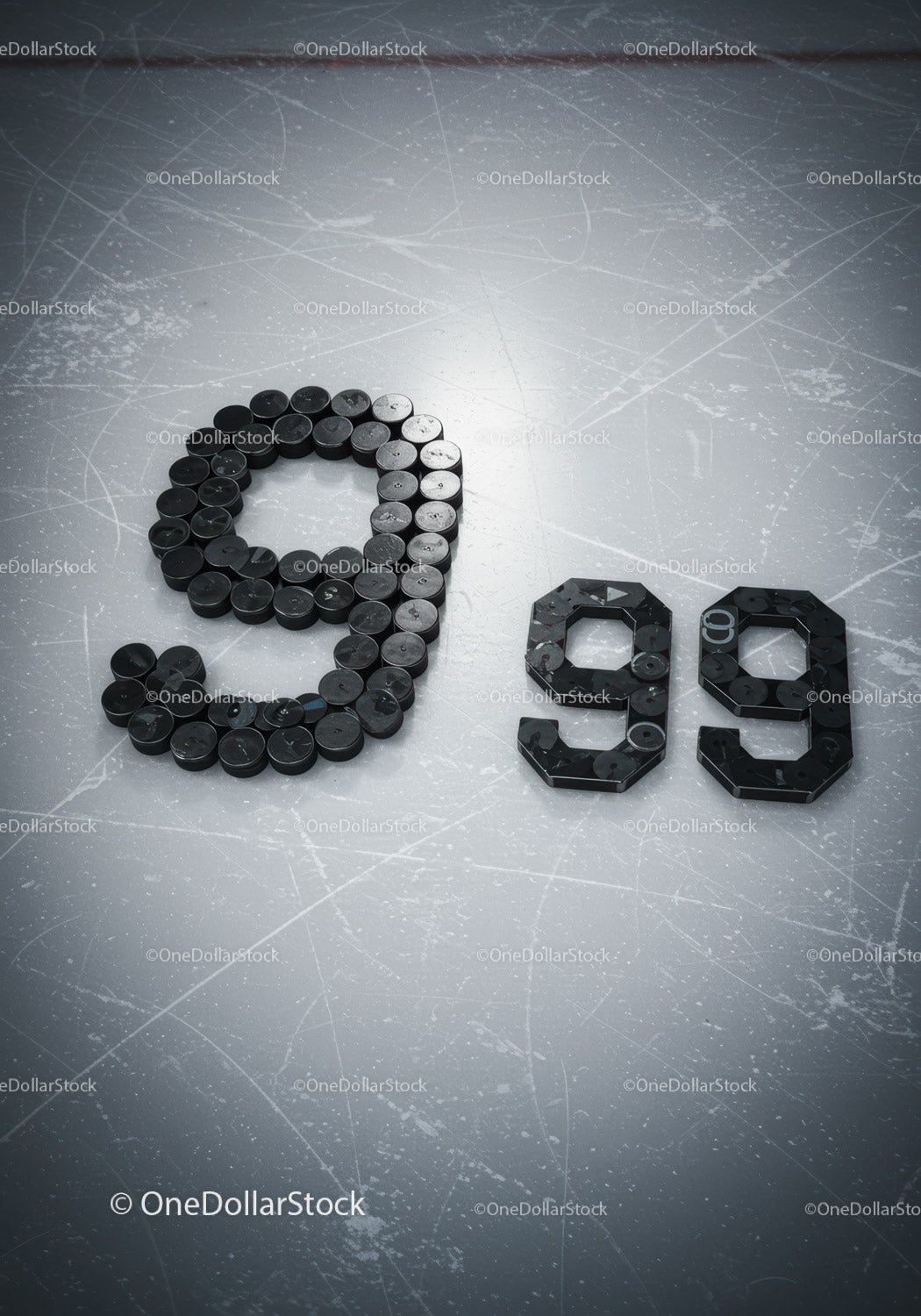 Hockey Pucks Arranged as Number Ninety on Ice Rink