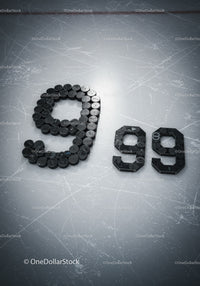 Hockey Pucks Arranged as Number Ninety on Ice Rink