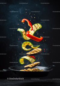 Grilled vegetables tossed in a black frying pan