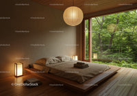 Minimalist bedroom with forest view and warm lighting