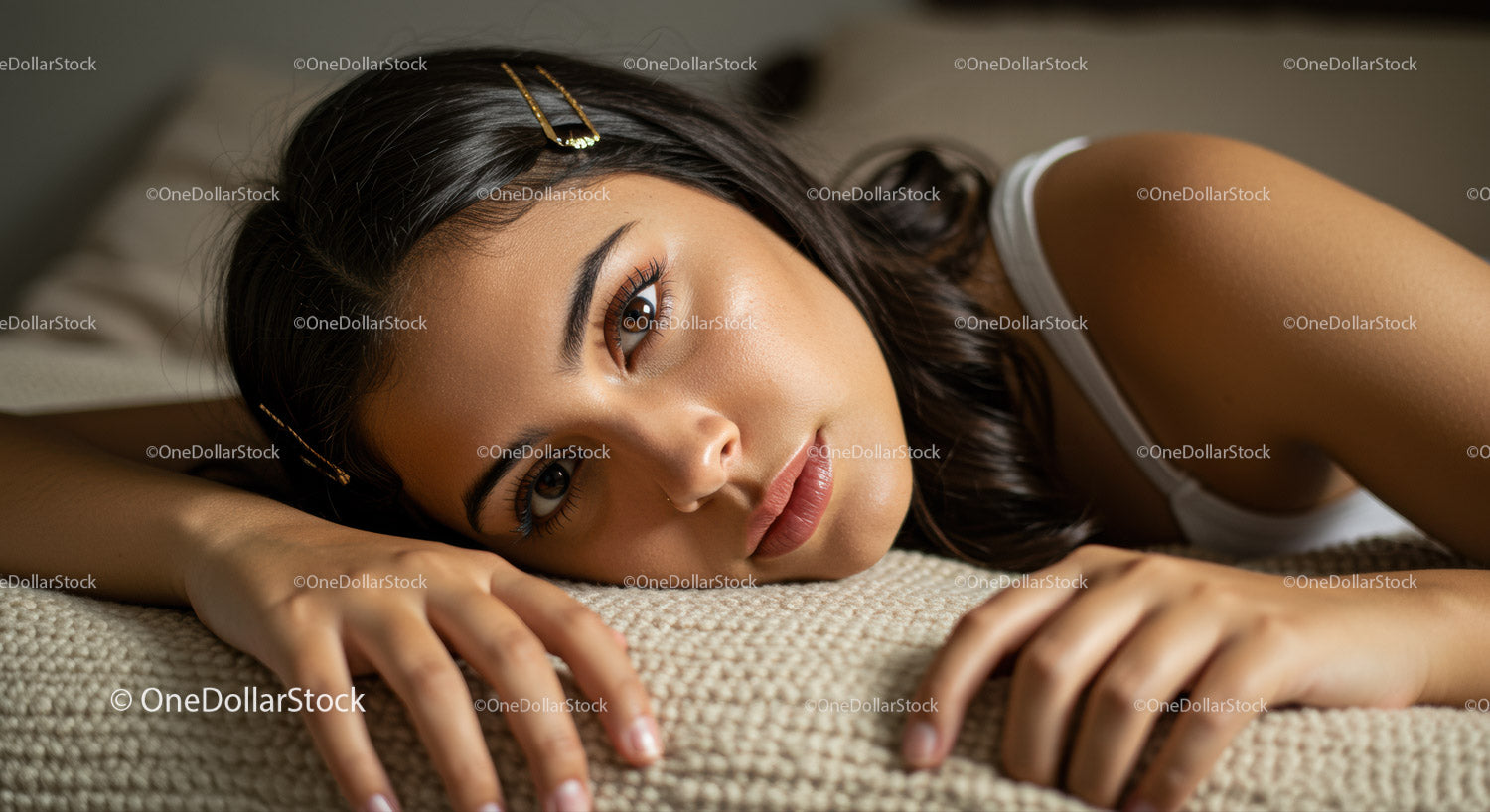 Elegant Woman Relaxing on Couch with Warm Interior Ambiance