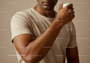Close-up of Man Applying Moisturizing Lotion to Arm in Self-care Routine