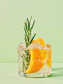 Refreshing Citrus Cocktail with Rosemary Garnish