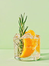 Refreshing Citrus Cocktail with Rosemary Garnish