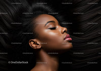 Side profile of serene woman with flowing hair