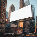Urban scene with blank billboard above city street