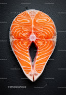Fresh salmon steak on textured black surface