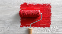 Red Paint Spread on White Wooden Surface with Roller Tool
