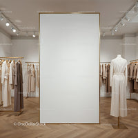 Minimalist clothing store interior with neutral tones