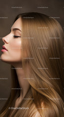 Profile of young woman with long smooth brown hair