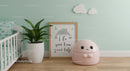 Cute Pink Robot Toy in Modern Nursery with Plants and Cloud Decorations