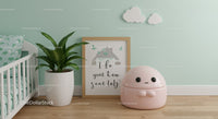 Cute Pink Robot Toy in Modern Nursery with Plants and Cloud Decorations