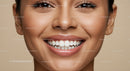 Close-up of cheerful woman with radiant smile