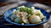 Boiled Eggs with Fresh Herbs and Seasoning on Rustic Blue Plate