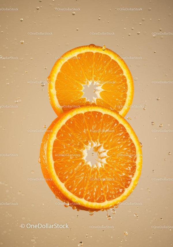 Fresh Orange Slices Submerged in Sparkling Water