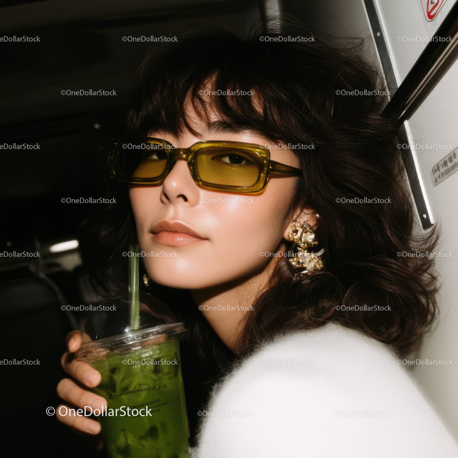Elegant Woman with Yellow Tinted Sunglasses and Statement Jewelry