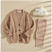 Cozy knitted cardigan and soft leggings with cute pillow