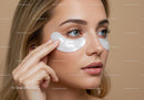 Close-up of Woman with Under-eye Cream Application for Youthful Skin