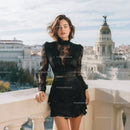 Stylish Woman in Black Lace Top and Skirt on City Terrace