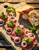Thinly Sliced Beef with Green Pea Puree and Red Onion